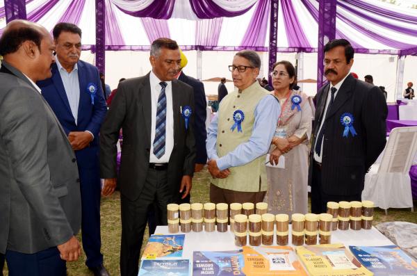 Dignitaries visiting exhibitions during National Conference on Fisheries at Vet University